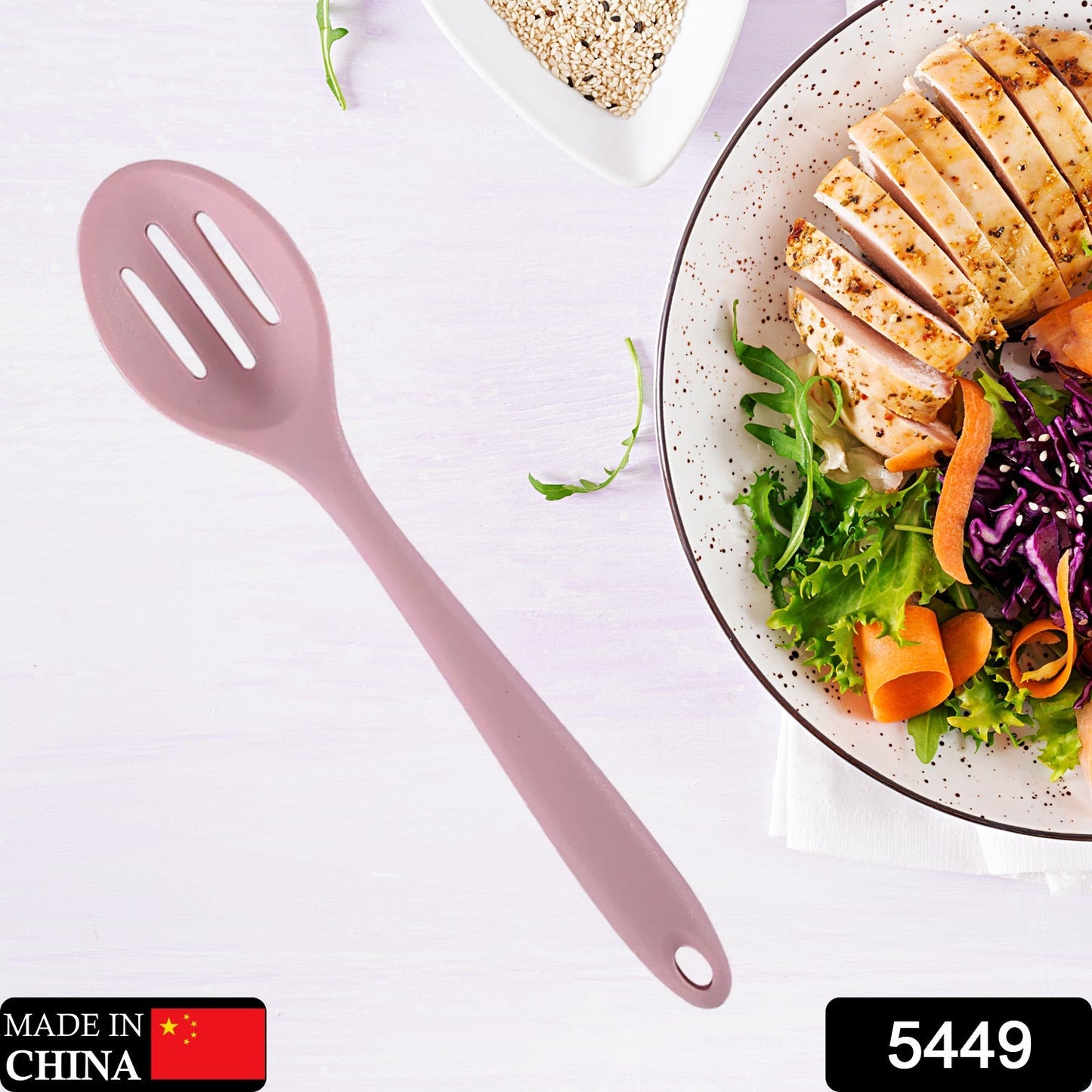 Silicone kitchen utensil, 27cm, heat-resistant and durable for cooking.