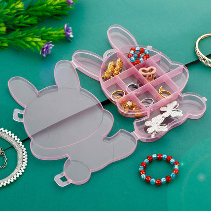 Bear-shaped clear plastic storage box for jewelry.