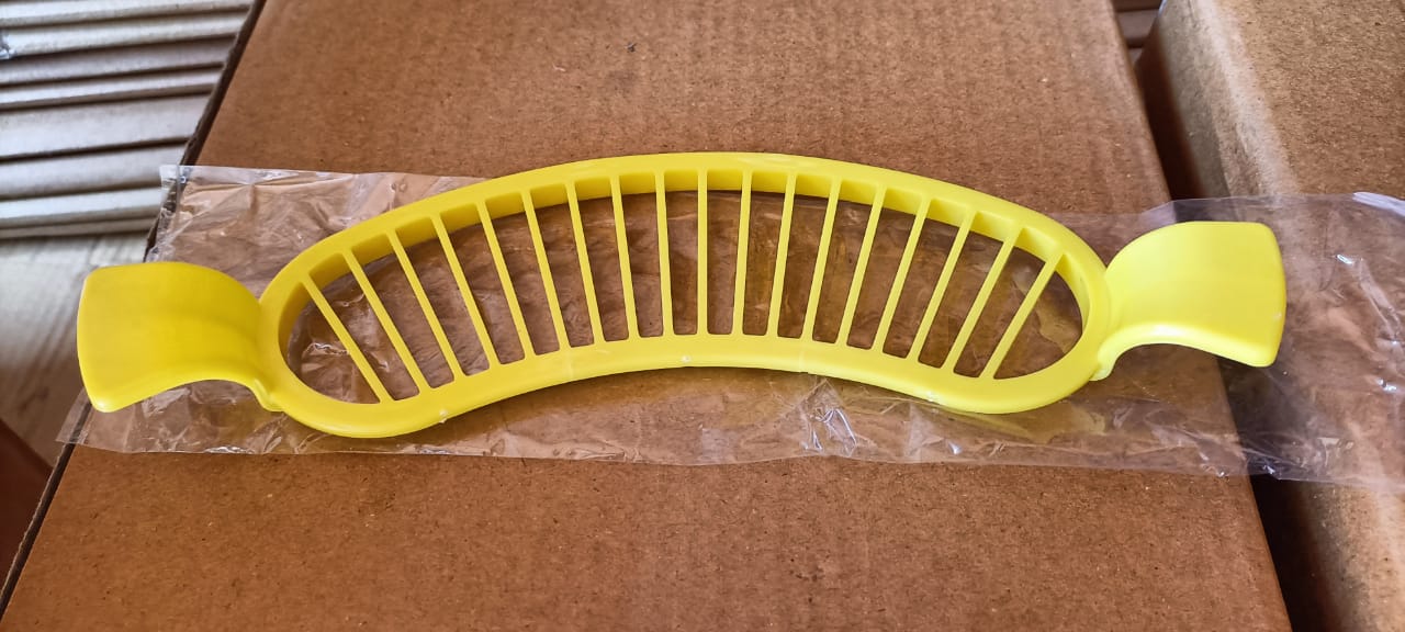 Banana slicer with handle for safe and efficient cutting.