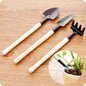 Set of 3 kid's garden tools including trowel, shovel, rake